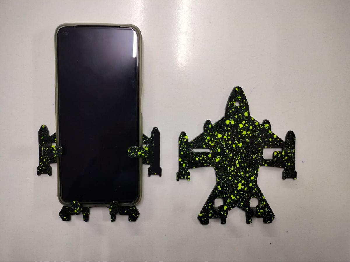 Fighter Jet Shape Plastic Mobile Holder Wall Mounted Mobile Stand Mobile Phones Charging Stand.(1 pc) 1 Fighter Jet Shape Plastic Mobile Holder Wall Mounted Mobile Stand Mobile Phones Charging Stand.(1 pc)